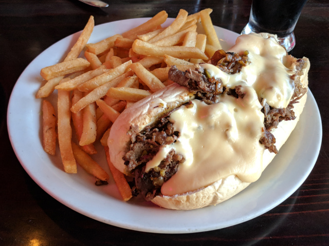 The 'Wit Cheesesteak', with fries.